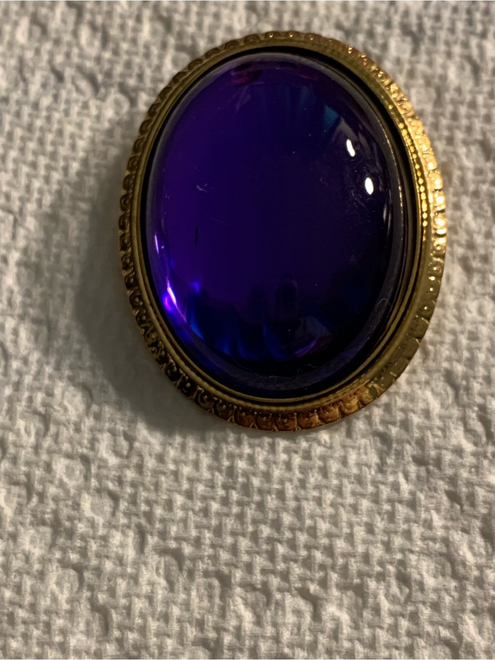 Gold-Tone Brooch with Deep Violet Cabochon Accent